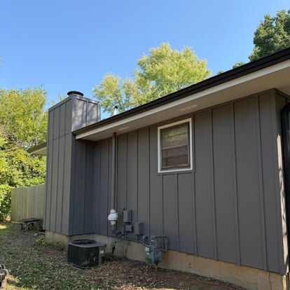 Completed exterior soffit, fascia, and siding repairs by ALX